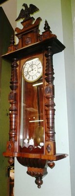 Lot 640 - A double weight driven 'Vienna' type wall clock, signed 'GB'