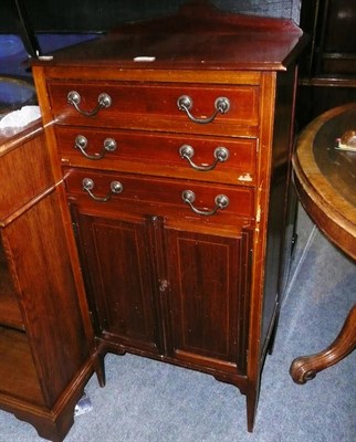 Lot 663 - A music cabinet