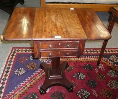 Lot 692 - A mahogany patience table on turned supports