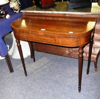 Lot 696 - Mahogany fold-over tea table