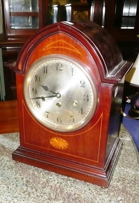 Lot 697 - A chiming inlaid table clock