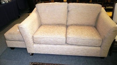 Lot 714 - Modern two seater sofa and footstool