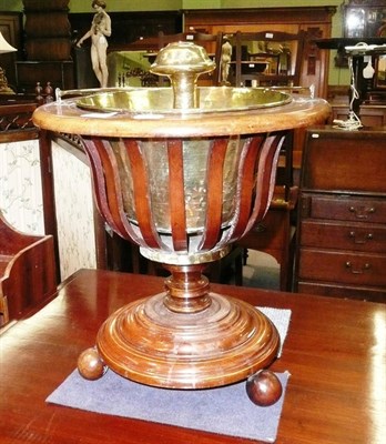 Lot 732 - Inlaid mahogany tripod jardiniere stand and an Islamic pouring vessel