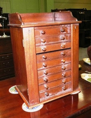 Lot 733 - A mahogany Wellington type collector's chest and a Chinese blue wool rug