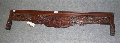 Lot 741 - A Chinese carved hardwood panel from a bedhead