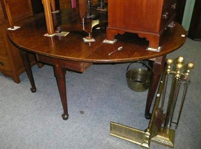 Lot 762 - Georgian oak gateleg dining table