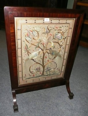 Lot 771 - A mahogany tapestry fire screen