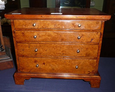 Lot 795 - Burr walnut miniature chest