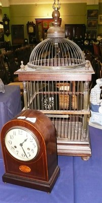 Lot 796 - An Edwardian inlaid mantel clock and a birdcage