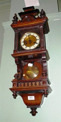 Lot 801 - A small striking wall clock