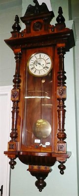 Lot 807 - A double weight driven 'Vienna' type wall clock signed `GB`