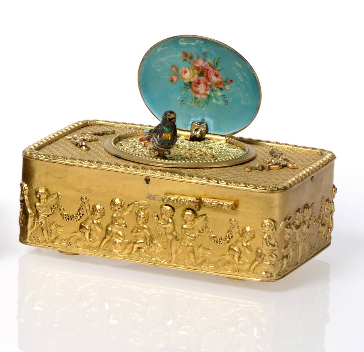 Lot 373 - A Singing Bird Musical Automaton, late 19th century, the rectangular box decorated with applied...