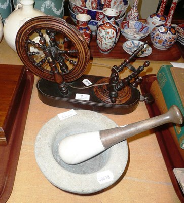 Lot 7 - A treen spinning wheel and a pestle and mortar