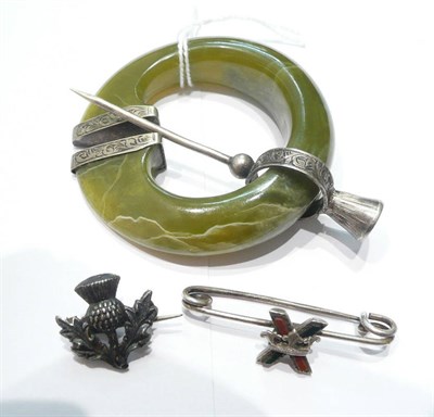 Lot 66 - A kilt pin, a hardstone brooch and a thistle brooch