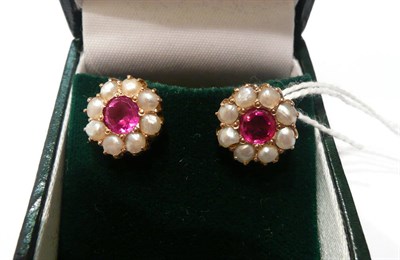 Lot 73 - A pair of synthetic ruby and pearl cluster stud earrings