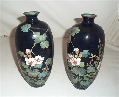 Lot 138 - A pair of Japanese cloisonne enamel 'Spiders web' vases