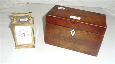 Lot 153 - A 19th century two division mahogany tea caddy and a brass carriage clock