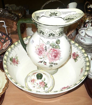 Lot 159 - A Royal Doulton 'Indestructible Flowers' toilet ewer, basin and soap dish