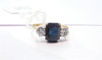 Lot 202 - A sapphire and diamond three stone ring