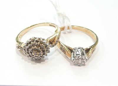 Lot 218 - A 9ct gold diamond solitaire and a 9ct gold diamond cluster ring