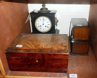 Lot 226 - A black slate mantel clock with gilt metal mounts, an Art Deco mantel clock, a walnut cross...