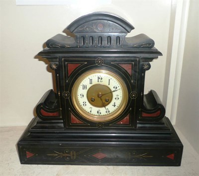 Lot 240 - A late Victorian black slate mantel clock
