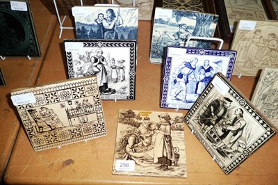 Lot 256 - Seven assorted tiles with transfer printed decoration