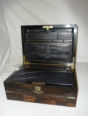 Lot 271 - A coromandel writing box with leather lined writing slope