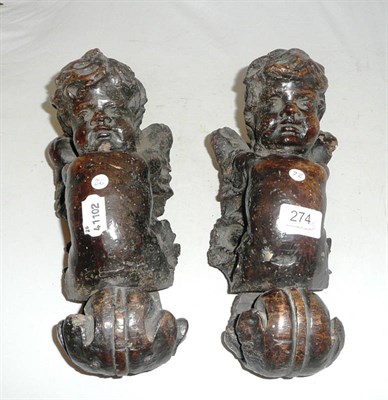 Lot 274 - Pair of Italian walnut cherubs