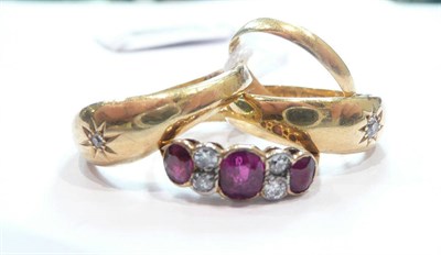 Lot 293 - Two 18ct gold rings gipsy set with diamonds, a garnet and diamond set ring and a 22ct gold...