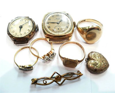 Lot 301 - Four various rings, two watch heads, a bar brooch and a locket