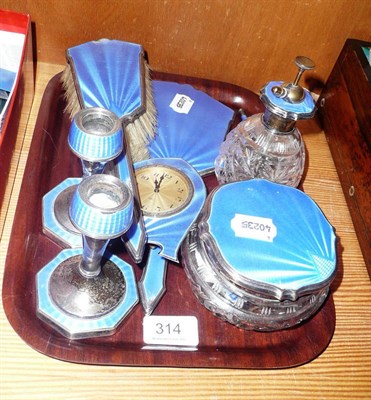 Lot 314 - A silver and blue enamel eight piece dressing table set (some damages to enamel)