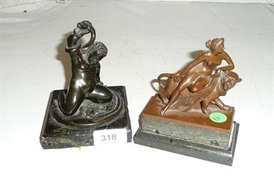 Lot 318 - Regency bronze boy fighting a snake and a classical bronze of a maiden on a large cat