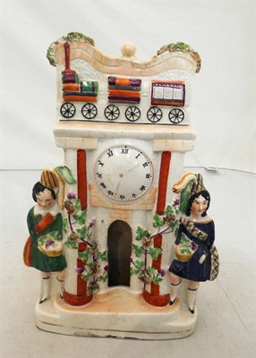 Lot 322 - Staffordshire 'Railway' clock group