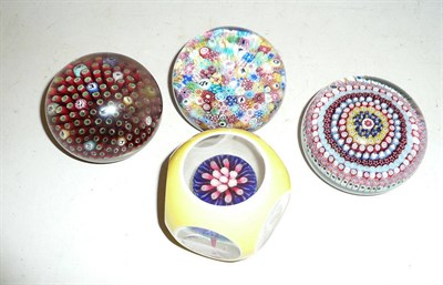 Lot 324 - Four Baccarat glass paperweights