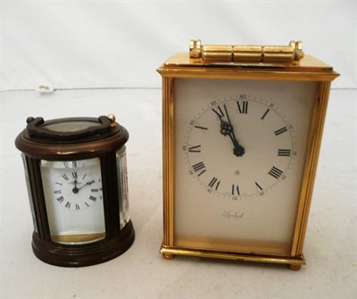 Lot 325 - Asprey mignonette oval carriage timepiece and Imhof brass timepiece