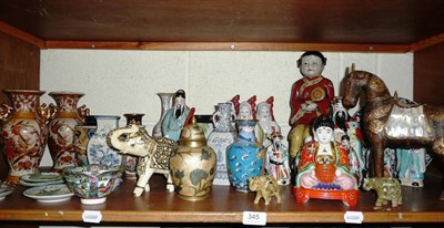 Lot 345 - Shelf of Oriental figures and vases etc