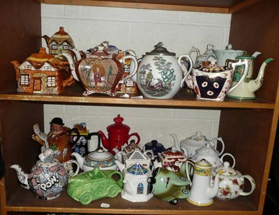 Lot 358 - Two shelves of collectable tea pots