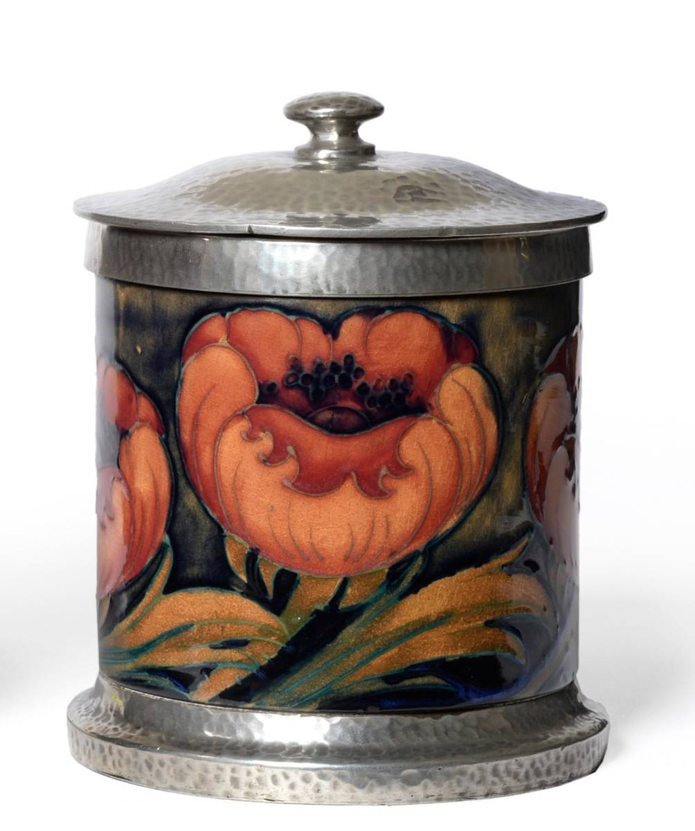Lot 413 - A William Moorcroft Big Poppy Pattern Jar and Cover, circa 1925, with Tudric pewter rim, base...