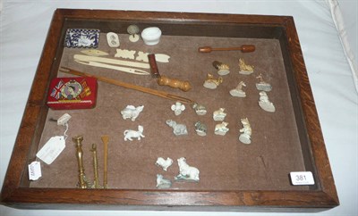 Lot 381 - Wade Whimsie figures, brass pastry cutters, moulds, sundry and display case