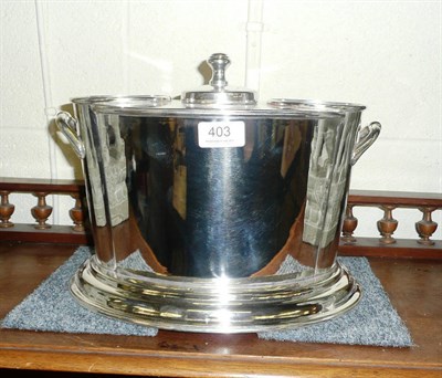 Lot 403 - An oval silver plated wine cooler