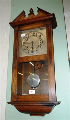 Lot 487 - Oak wall clock