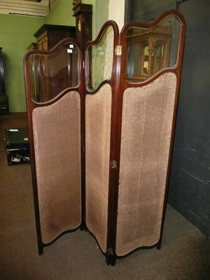 Lot 488 - A Victorian three section folding screen with shaped glass panels