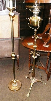 Lot 495 - Two brass standard lamps