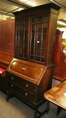 Lot 504 - 1920's oak bureau bookcase