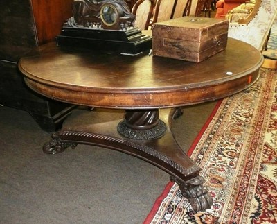 Lot 521 - A 19th century carved oak breakfast table