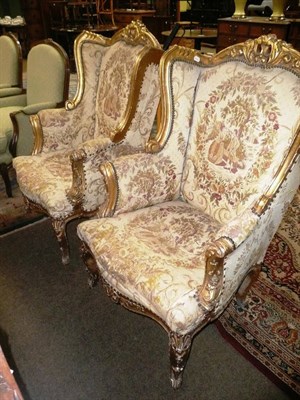 Lot 530 - A pair of large Louis XIV style gilt chairs