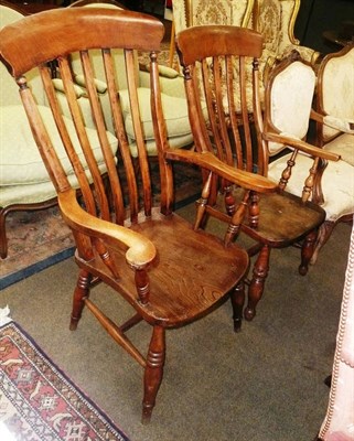 Lot 532 - Two late Edwardian slat back kitchen chairs