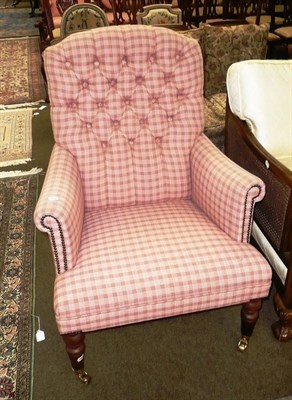 Lot 541 - Button back armchair in rust plaid