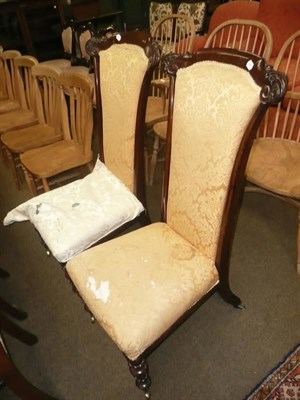 Lot 552 - Two Victorian prie dieu chairs